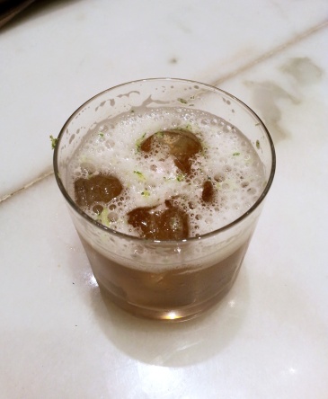 An Indian version of Cuba Libre with Old Monk, black salt and gated Yuzu